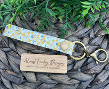 Load image into Gallery viewer, Genuine Leather Key Chain Wristlet - Genuine Leather Accessories - Key Wristlet - Key Chain - Flowers - Spring Flowers - Floral - Poppies - Mustard