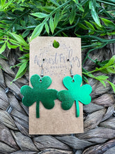 Load image into Gallery viewer, Genuine Leather Earrings - Saint Patrick's Day - Green Earrings - Three Leaf Clovers - Metallic Green - Metallic Leather - Clovers - Shamrocks - Statement Earrings